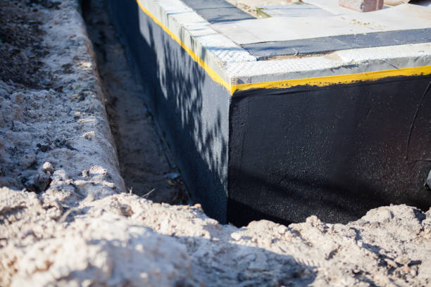 Professional Interior Drainage System technician working in Louisville, OH